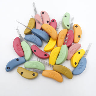 Ullnåla tett filtenålholder